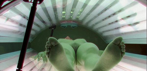  Shaved and Tight Pussy Caught in Solarium